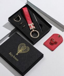 KeyAmor Elegant metal and quilted leather keychain car key holder for adults.Includes a matching AirTag holder.  Stylish keychain with golden crystal-accented rings, perfect for women, featuring 3 key rings for added functionality. Made with elegant red leather, offers 360-degree rotation, and comes in a fancy gift box, making it a perfect gift choice.